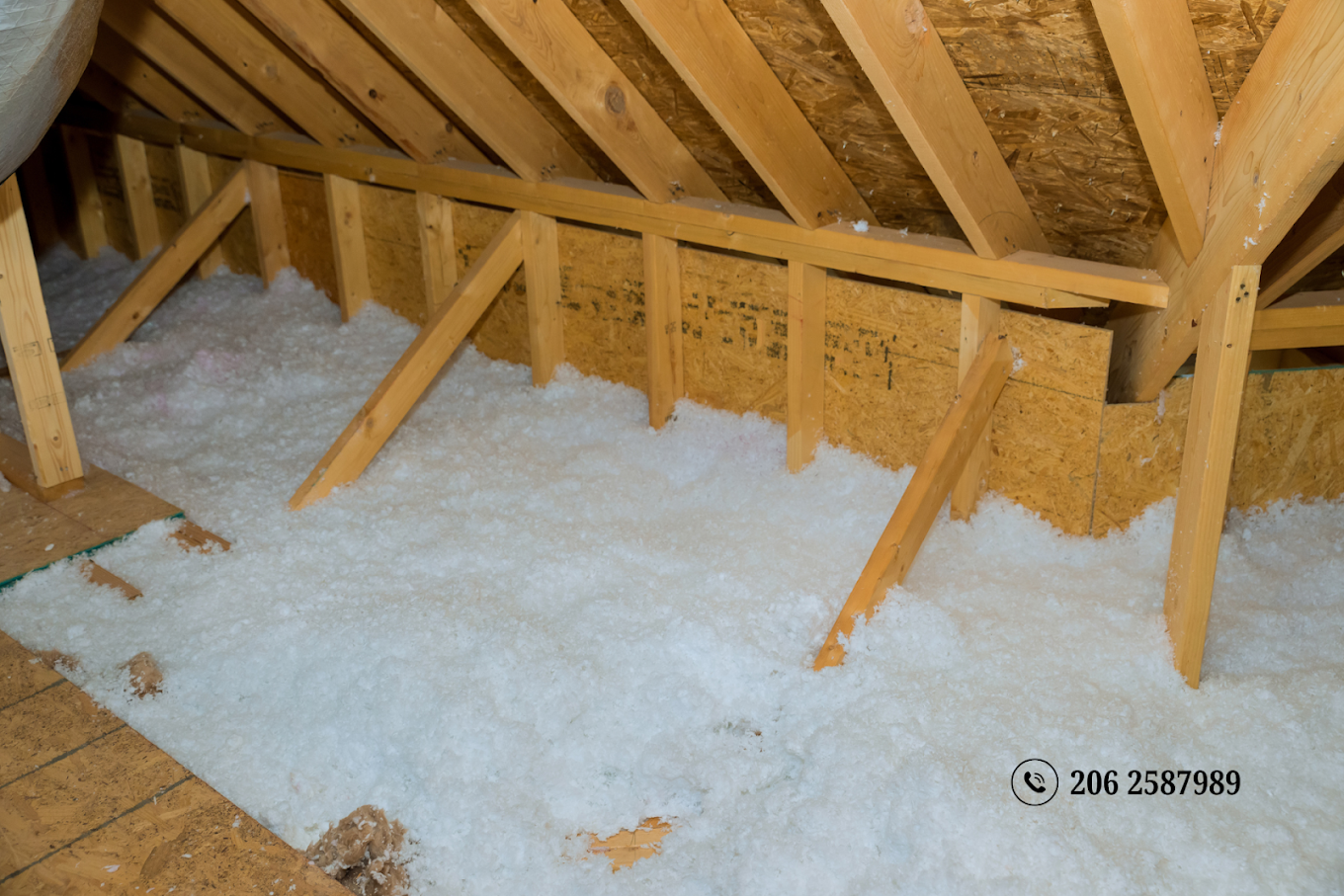 Attic with timber framing and loose-fill insulation